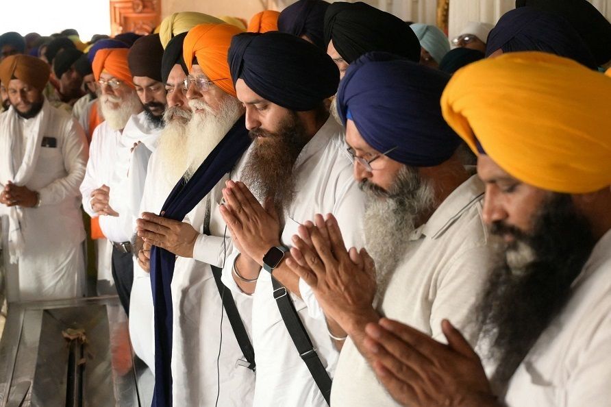 Activists of the Dal Khalsa Sikh organisation, a pro-Khalistan group, offer prayers for Sikh separatist Hardeep Singh Nijjar, who was killed in June 2023 near Vancouver, at the Golden Temple in Amritsar, Punjab, India, on 29 September 2023. (Narinder Nanu/AFP)