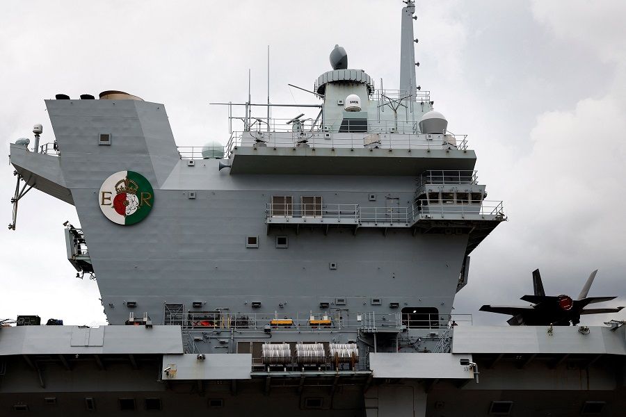 The British Royal Navy's HMS Queen Elizabeth aircraft carrier sits anchored at the US naval base in Yokosuka, Kanagawa prefecture on 6 September 2021. (Kiyoshi Ota/AFP)