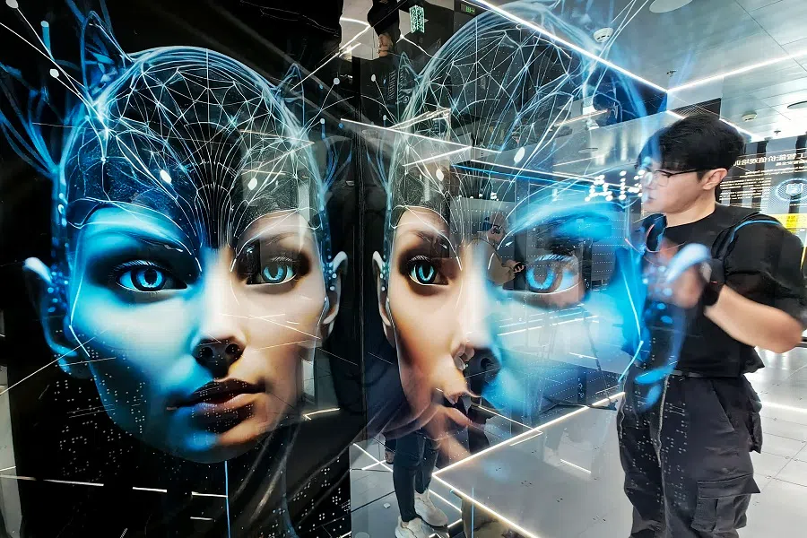 People visit the immersive “AI’s Dream” exhibition at Shanghai Tower, in China, on 12 April 2024.   