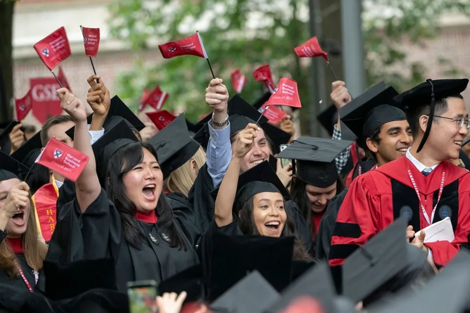 Students cheer during the 374th Harvard Commencement in Harvard Yard in Cambridge, Massachusetts, on 29 May 2025. (Rick Friedman/AFP)