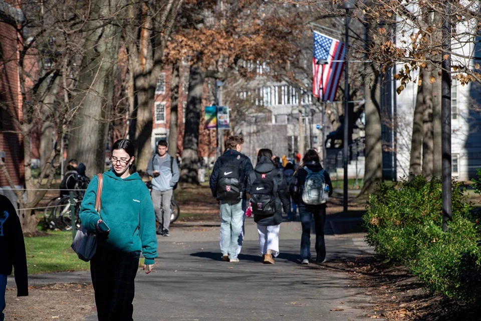 People walk through Harvard Yard at Harvard University in Cambridge, Massachusetts, on 12 December 2023. (Joseph Prezioso/AFP)
