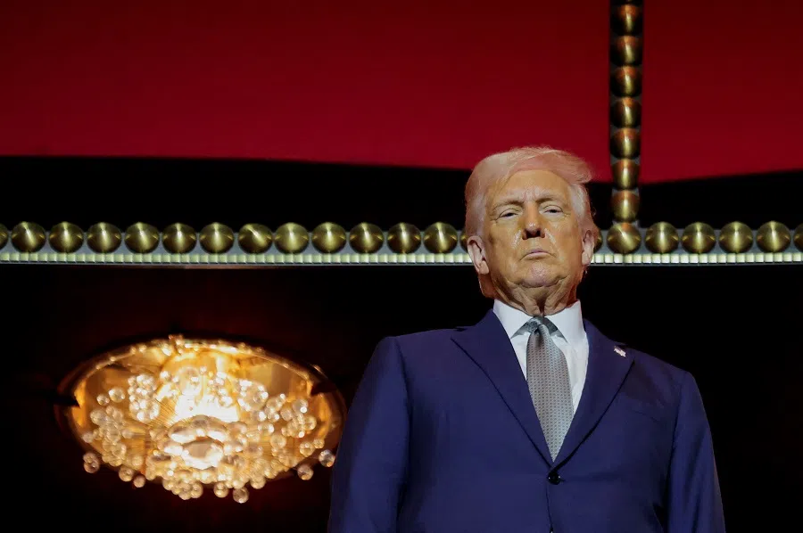 US President Donald Trump gestures stands at the presidential box at the Kennedy Center, in Washington, DC, US, on 17 March 2025.