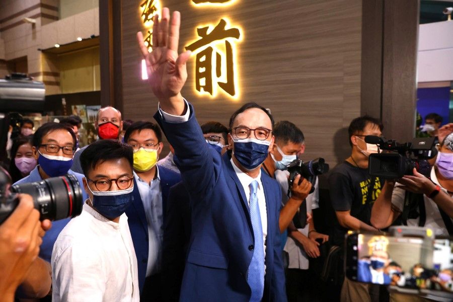 Eric Chu waves to supporters after winning the chairmanship of Taiwan's main opposition Kuomintang Party (KMT), in Taipei, Taiwan, 25 September 2021. (Ann Wang/Reuters)