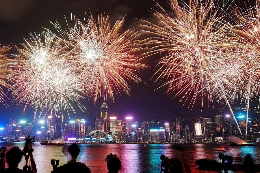 Fireworks light up over Victoria Harbour to celebrate the 75th anniversary of China’s National Day, in Hong Kong, China, on 1 October 2024. (Lam Yik/Reuters)