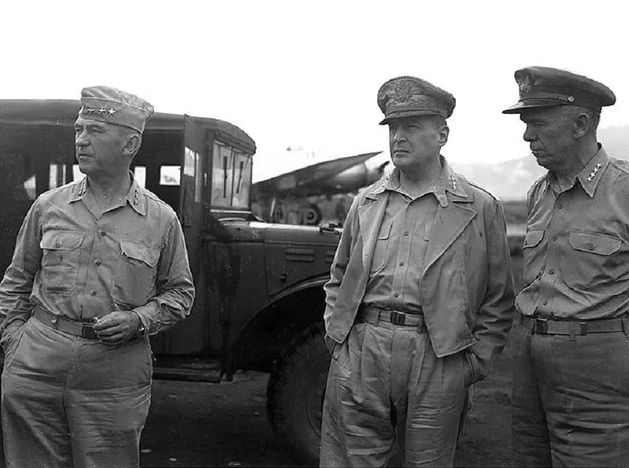 Lieutenant General Walter Krueger, commanding general, US Sixth Army (left), General Douglas MacArthur, supreme commander, Allied Forces, Southwest Pacific Area (centre), and General George C. Marshall, chief of staff, US Army (right), at a field headquarters in the Southwest Pacific Area, late 1943. (Wikimedia)