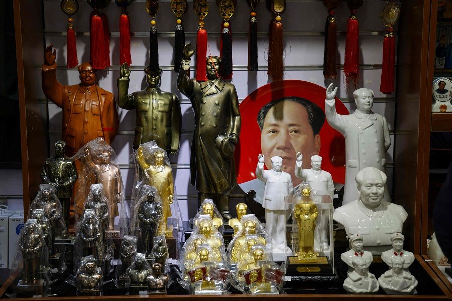 Small statues of late communist leader Mao Zedong are seen at a shop in Beijing, China, on 5 April 2023. (Ludovic Marin/AFP)