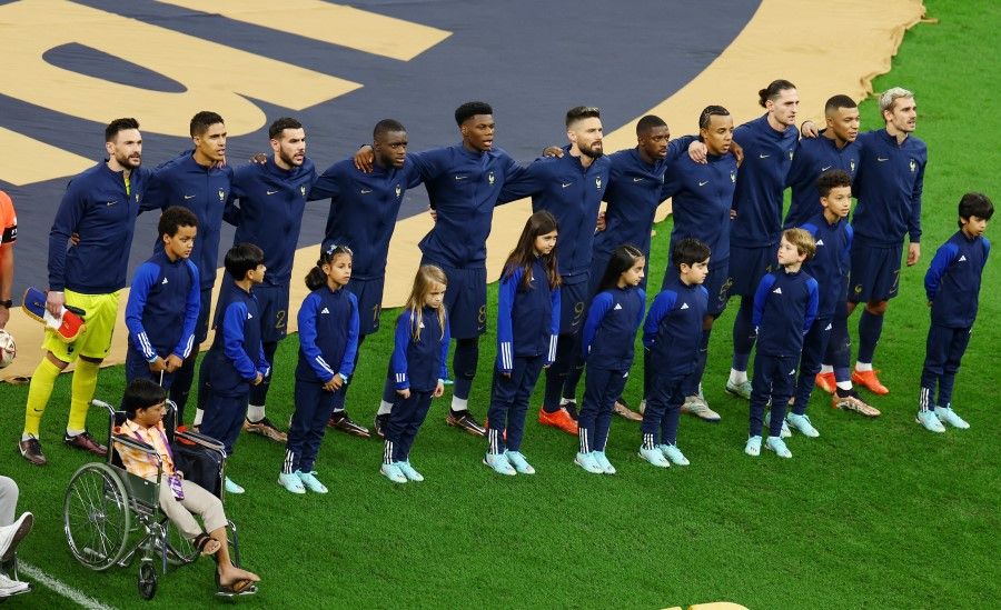 The France football team during the national anthems before the FIFA World Cup final with Argentina at Lusail Stadium, Lusail, Qatar, 18 December 2022. European football teams are seeing an increase in non-Caucasian players. (Molly Darlington/Reuters)