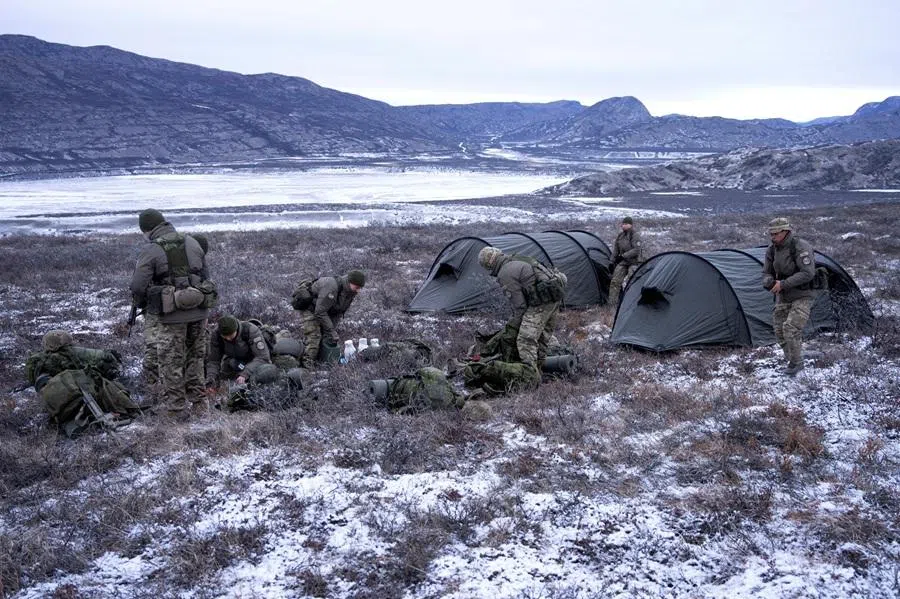 People take part in the Arctic Basic Training managed by the Arctic Command, in Kangerlussuaq, Greenland, on 20 February 2026. (Ritzau Scanpix/Bo Amstrupvia/Reuters)