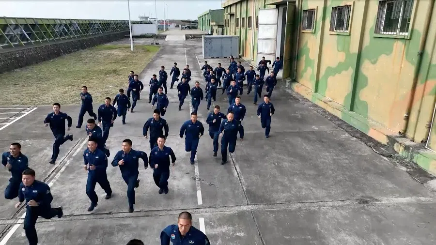 Members of the Chinese People’s Liberation Army (PLA) take part in the “Joint Sword-2024B” military drills around Taiwan, from an undisclosed location in this screenshot from a handout video released by the PLA Eastern Theatre Command on 14 October 2024. (PLA Eastern Theatre Command/Handout via Reuters)