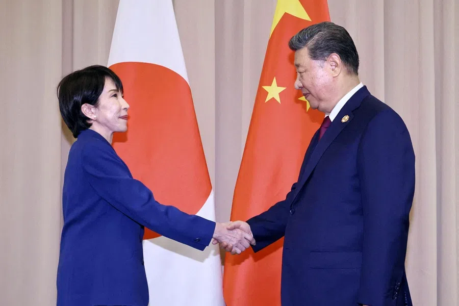 Japanese Prime Minister Sanae Takaichi shakes hands with Chinese President Xi Jinping ahead of their talks in Gyeongju, South Korea, 31 October 2025 in this photo distributed by Kyodo.