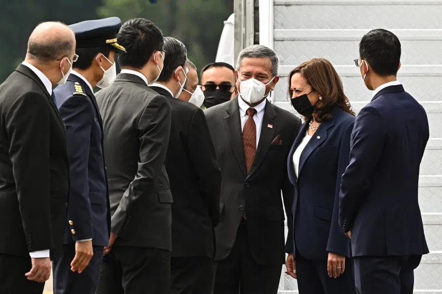 US Vice-President Kamala Harris, with Singapore's Foreign Minister Vivian Balakrishnan, speaking to Singapore's ambassador to the US Ashok Kumar Mirpuri after arriving at Paya Lebar Air Base, 22 August 2021. (SPH)