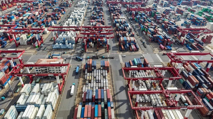 Containers are seen at the port of Qingdao, in China’s eastern Shandong province on 26 August 2026.