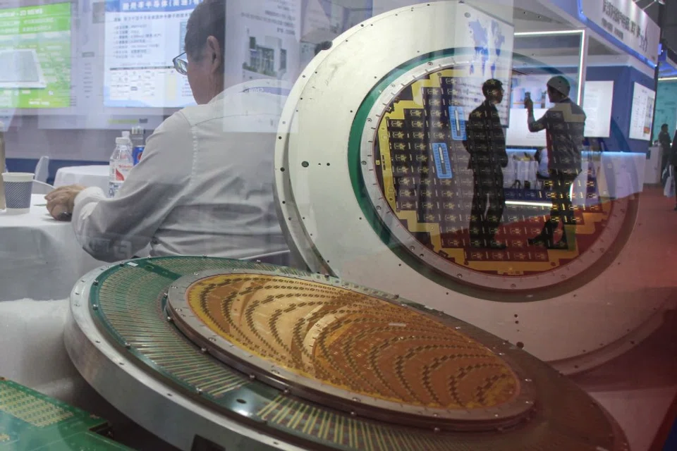 This photo taken on 22 March 2024 shows semiconductor products of Maxone semiconductor company displayed during the SEMICON China semiconductor exhibition in Shanghai. “Support Chinese chips, join the enterprise of the century” read an upbeat slogan at a recent semiconductor industry fair in Shanghai. (Rebecca Bailey/AFP)