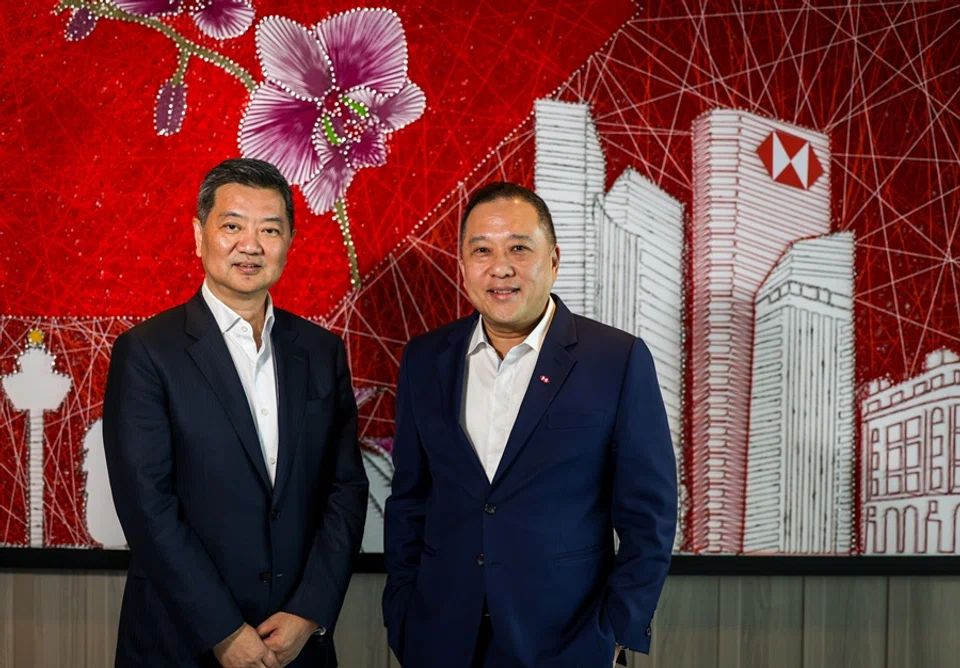 Wong Kee Joo (right), CEO of HSBC Singapore, and Mark Wang, president and CEO of HSBC Bank China Co Ltd, sat down for an exclusive interview with Lianhe Zaobao. (Jonathan Yeap/SPH Media)