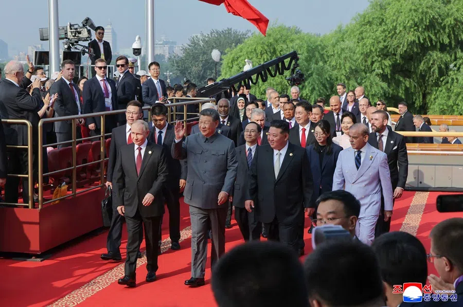 This picture taken on 3 September 2025 and released from North Korea’s official Korean Central News Agency (KCNA) on 4 September 2025 shows Russia’s President Vladimir Putin, China’s President Xi Jinping and North Korean leader Kim Jong Un arriving to a military parade marking the 80th anniversary of victory over Japan and the end of World War II, in Beijing’s Tiananmen Square.
