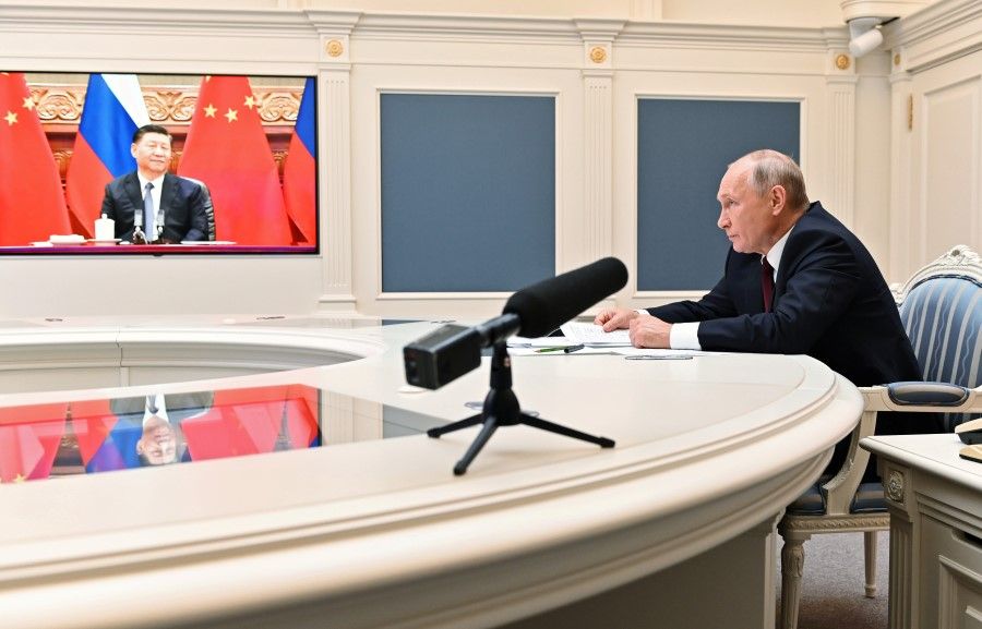 Russian President Vladimir Putin takes part in a video conference call with Chinese President Xi Jinping at the Kremlin in Moscow, Russia, 28 June 2021. (Alexei Nikolsky/Kremlin via Reuters)