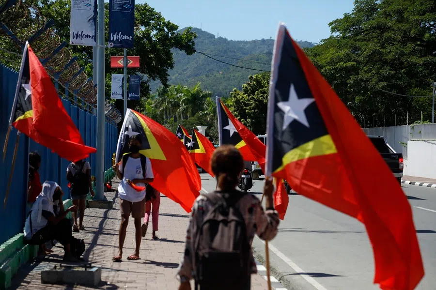 Young people displaying Timor-Leste’s flag in Dili. (SPH Media)