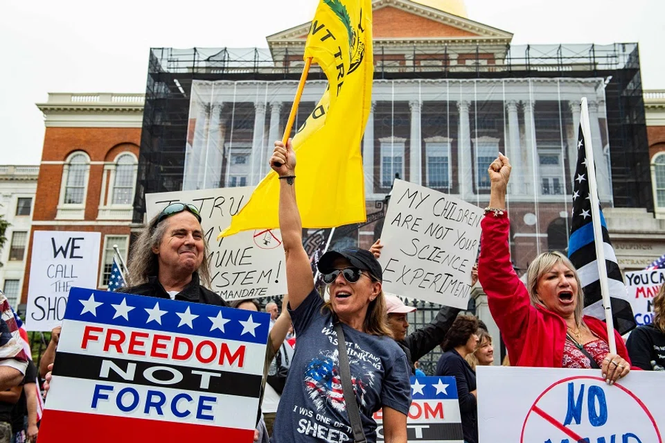 Demonstrators gathered outside the Massachusetts State House in Boston to protest Covid-19 vaccination and mask mandates. (Joseph Prezioso/AFP)