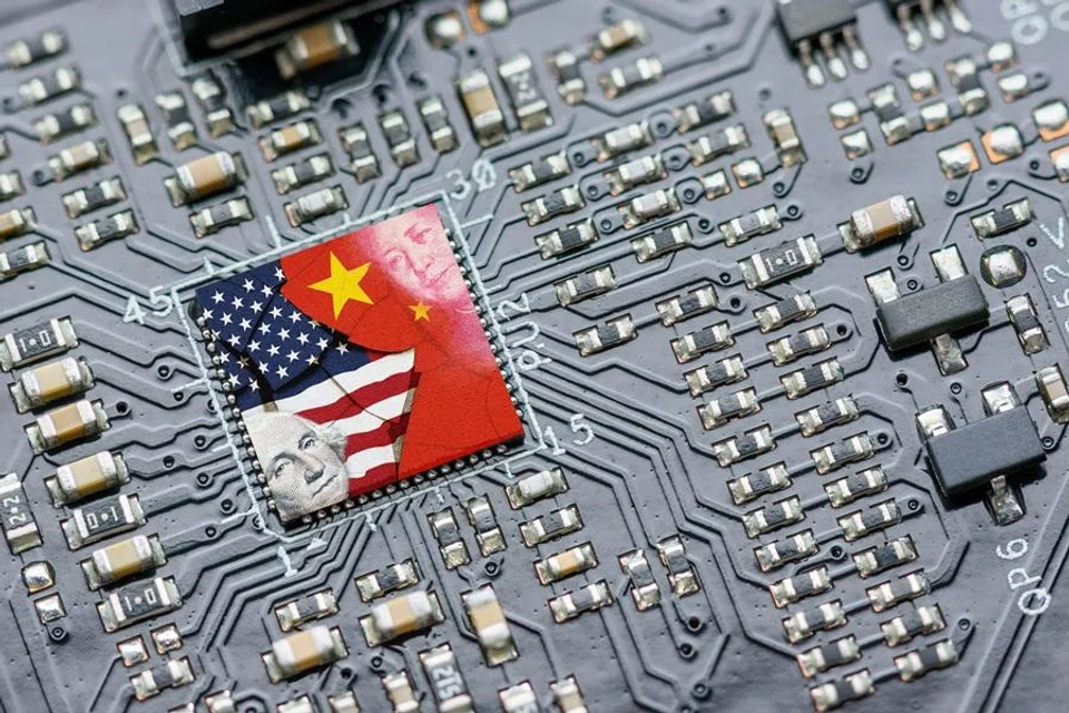 USA and China flags on a computer part. (iStock)