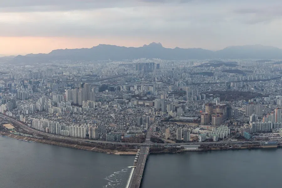 Commercial and residential buildings seen from the rooftop of the Lotte Corp. World Tower in Seoul, South Korea, on 28 November 2023. (SeongJoon Cho/Bloomberg)