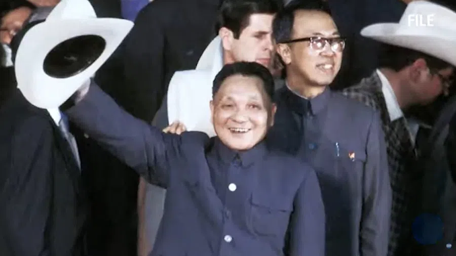 A screen grab from a video featuring Deng Xiaoping with his cowboy hat in 1979.