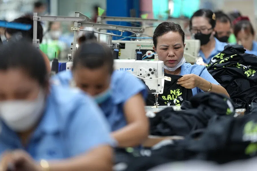 Vietnamese garment factory workers stitch apparel at a factory in Ho Chi Minh City, Vietnam, on 3 April 2025, after US President Donald Trump unveiled sweeping new tariffs on trading partners.