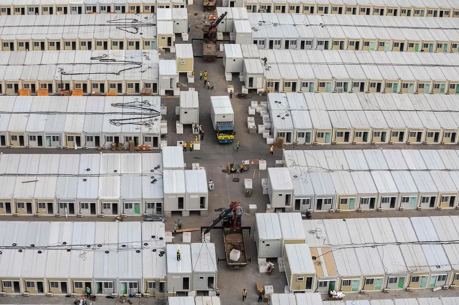 This photo shows an under-construction temporary isolation facility to house Covid-19 patients in Hong Kong, on 2 March 2022. (Dale de la Rey/AFP)