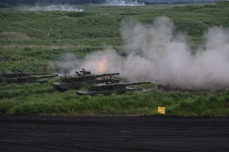 Japan's Ground Self-Defense Forces (JGSDF) Type-10 tanks move during a live fire exercise at JGSDF's training grounds in the East Fuji Maneuver Area in Gotemba, Japan, on 7 June 2026.