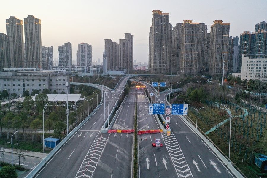 This aerial photo taken on 10 March 2020 shows an empty street in Wuhan in China's central Hubei province, following a lockdown to curb the spread of Covid-19. (AFP)