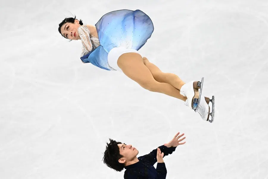 China's Sui Wenjing and Han Cong compete in the pair free skating of the figure skating event during the 2022 Winter Olympic Games at the Capital Indoor Stadium in Beijing on 19 February 2022. (Anne-Christine Poujoulat/AFP)