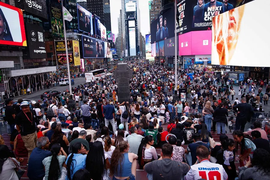 Tourists visit Times Square in New York City on 19 April 2024.
