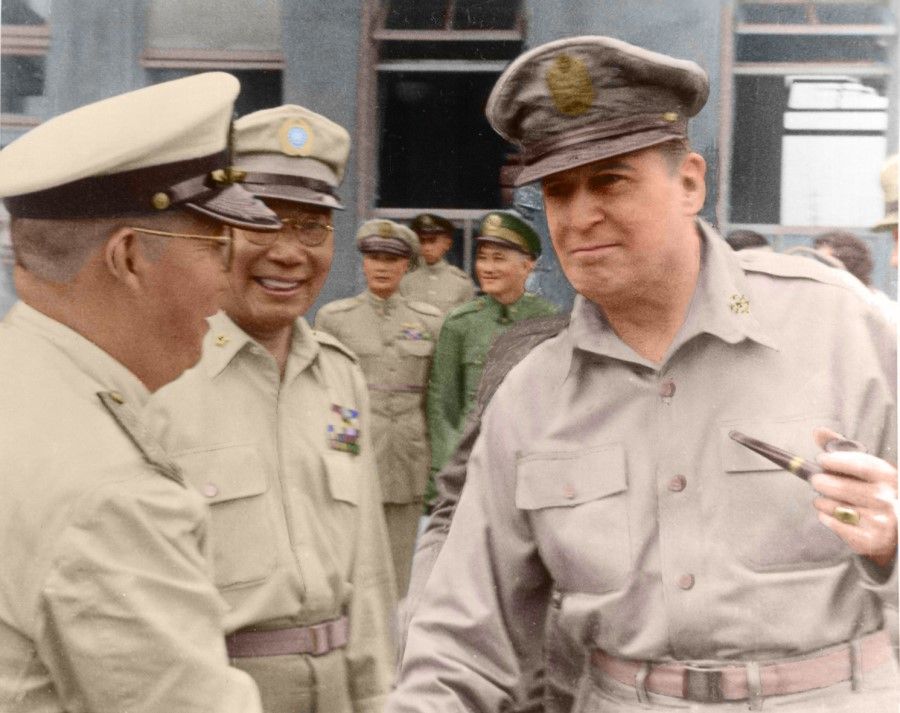 General MacArthur with KMT generals, 1 August 1950. When the Korean War broke out, the KMT government retreated to Taiwan and MacArthur made a trip there to discuss how to counter the CCP's military expansion.