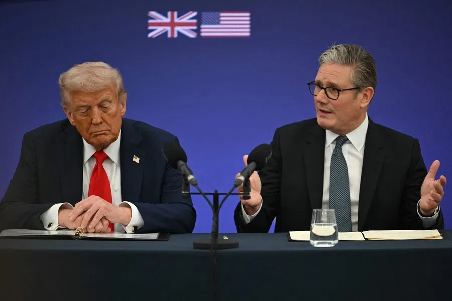 UK Prime Minister Keir Starmer (R) speaks next to US President Donald Trump (L) at the start of a business event at Chequers in Aylesbury, central England, on 18 September 2025, on the second day of the US president's second state visit.