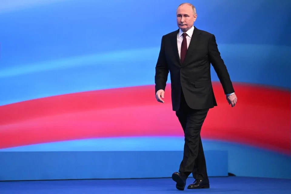 Russian President and presidential candidate Vladimir Putin meets with the media at his campaign headquarters in Moscow on 18 March 2024. (Natalia Kolesnikova/AFP)