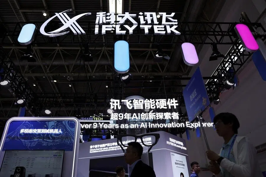 People walk past the iFlytek booth during the China International Supply Chain Expo (CISCE) in Beijing, China, on 22 June 2026.