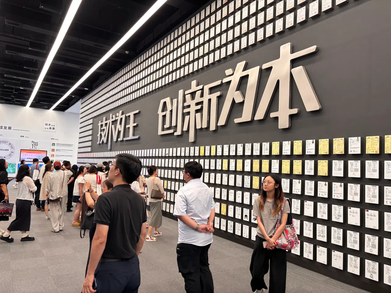 The exhibition hall at BYD’s headquarters in Shenzhen’s Pingshan is bustling with visitors.