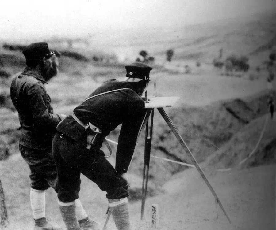 Japanese engineers measuring the railway line, continuously expanding railway transportation, circa 1935.