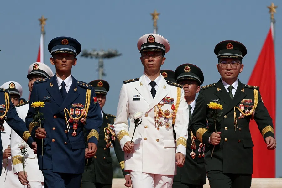 Members of the Chinese Peoples’ Liberation Army (PLA) in a shot at Tiananmen Square in Beijing, China, 30 September 2025. (Florence Lo/Reuters)