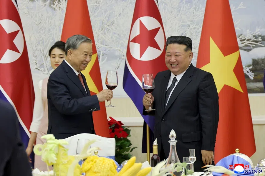 This picture taken on 9 October 2025 and released by North Korea's official Korean Central News Agency (KCNA) on 10 October 2025 shows North Korean leader Kim Jong Un (right) and Vietnam’s Communist Party General Secretary To Lam (left) attending a welcome banquet at the headquarters of the Central Committee of the Workers’ Party of Korea in Pyongyang.