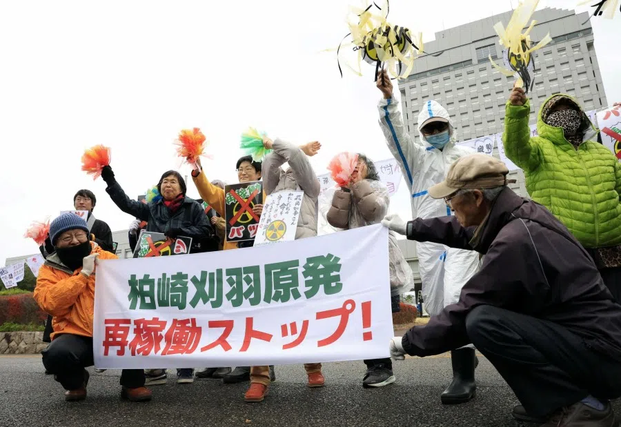 Members of a citizens group rally against Niigata prefecture governor Hideyo Hanazumi’s decision on a partial restart of the Kashiwazaki-Kariwa Nuclear Power Plant in Niigata, Japan, in this photo taken by Kyodo 21 November 2025. (Kyodo/via Reuters)
