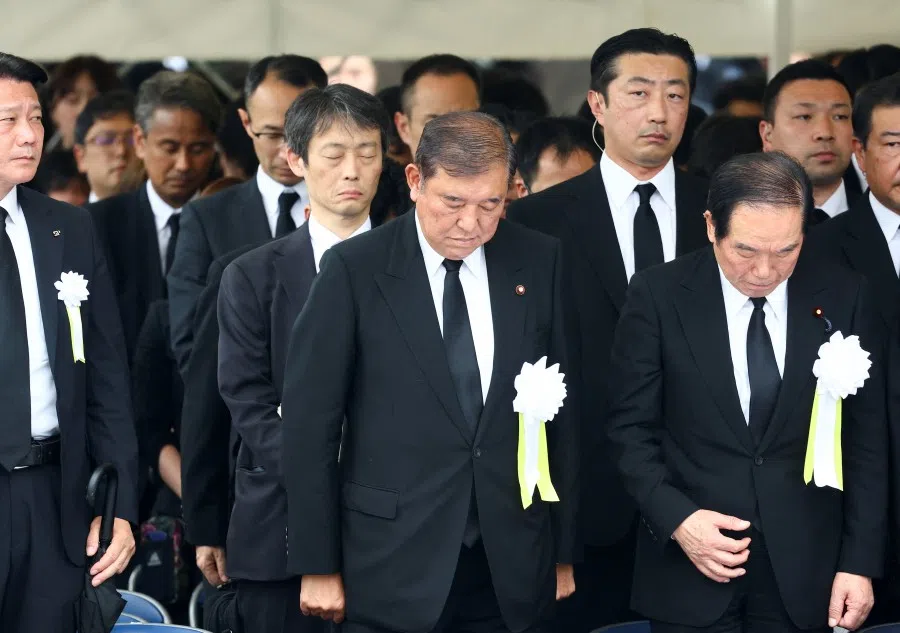 Japan’s Prime Minister Shigeru Ishiba pays tribute during a ceremony commemorating the 80th anniversary of the bombing of the city, at Nagasaki’s Peace Park in Nagasaki, southwestern Japan, on 9 August 2025. (Issei Kato/Reuters)