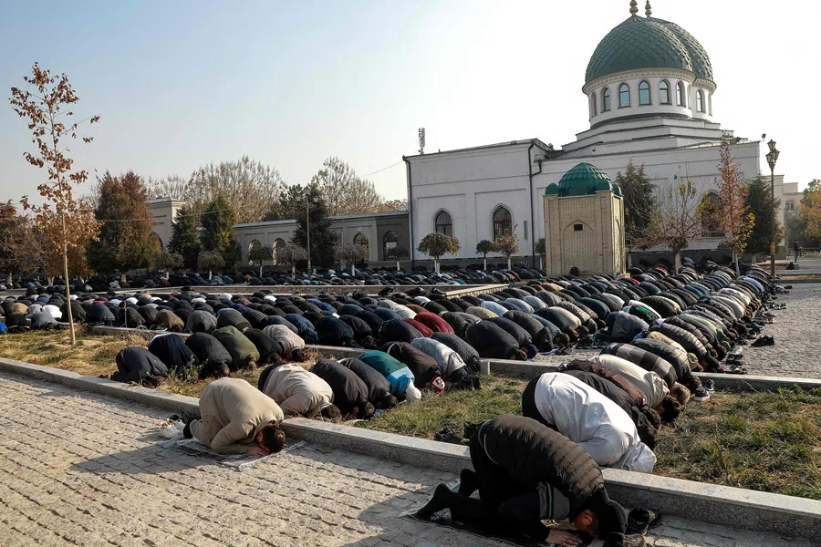 Uzbek Muslims perform a prayer outside a mosque in Tashkent, Uzbekistan, on 28 November 2025. (Temur Ismailov/AFP)