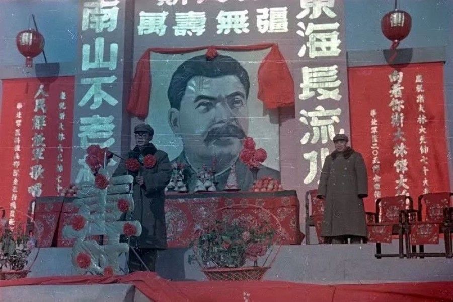Slogans celebrating the longevity of Marshal Stalin and the latter's portrait at the grand ceremony. (Photo taken by Vladislav Mikosha)
