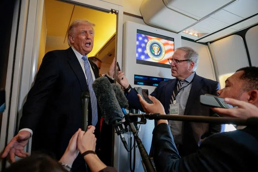 US President Donald Trump speaks to the press aboard Air Force One en route to the US following his official visit with President Xi Jinping in China, on 15 May 2026.