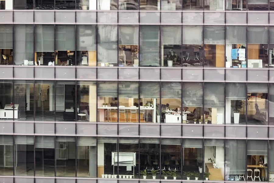 Offices and meeting rooms are seen inside a commercial building in Shanghai, China, on 9 March 2020. China's economy is beginning to revive, as the government signals progress in its battle against the coronavirus outbreak. (Qilai Shen/Bloomberg)