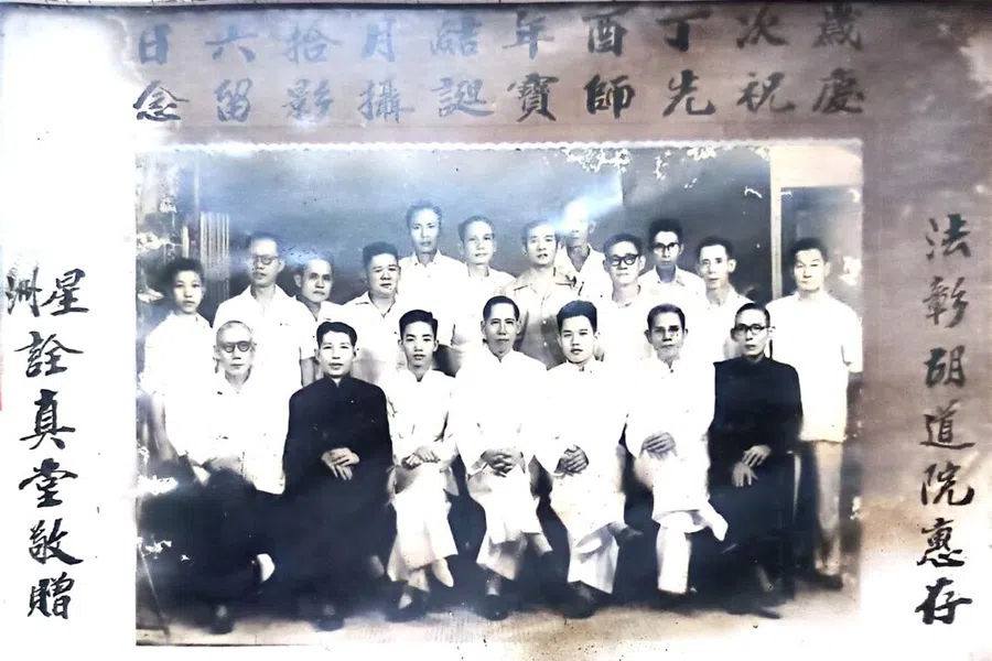 A rare photograph taken in 1957 features nam mou sifus. Seated second from the left in the front row is Woo Ying Poh’s father, Woo Yue Meng. (Photo provided by interviewee)
