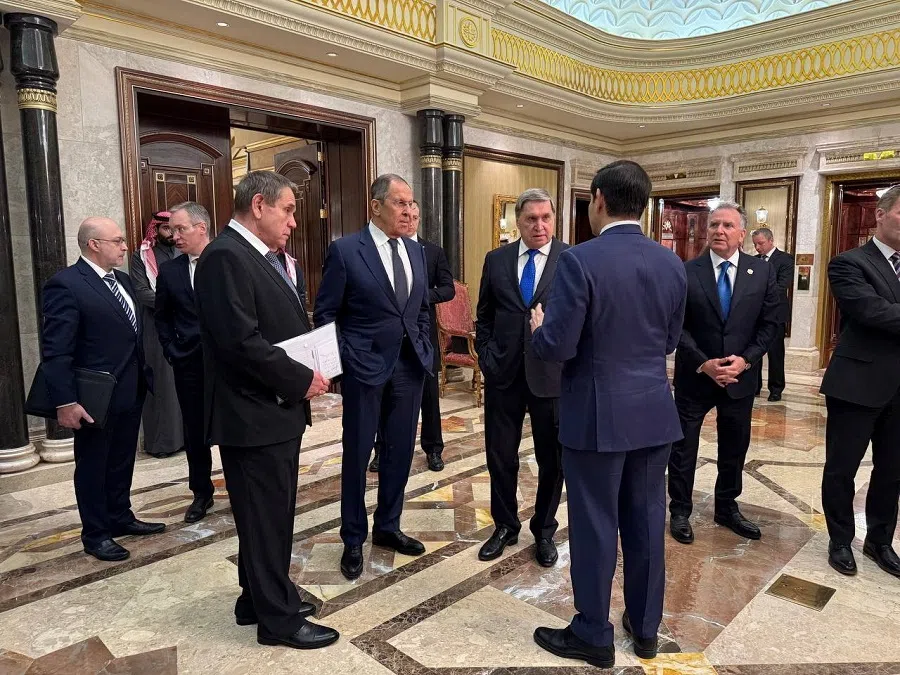 Russian Foreign Minister Sergey Lavrov and Russian President Vladimir Putin’s foreign policy adviser Yuri Ushakov listen to US Secretary of State Marco Rubio on the sidelines of the talks at Diriyah Palace in Riyadh, Saudi Arabia, on 18 February 2025. (Russian Foreign Ministry/Handout via Reuters)