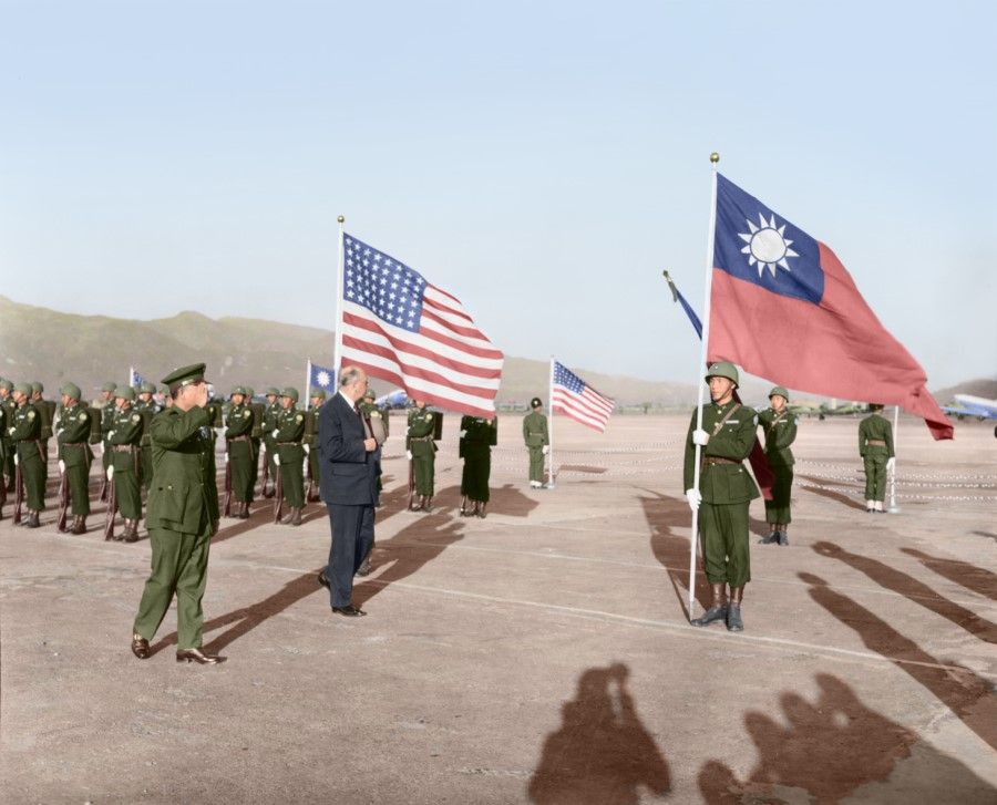 US senior officials visiting Taiwan, 1950s. At the time, the US government still recognised the ROC as the legal government representing China, and so the flags of the US and ROC were hung up.