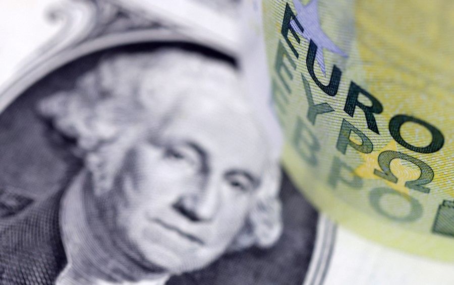 US dollar and Euro banknotes are seen in this illustration taken 17 July 2022. (Dado Ruvic/Reuters)