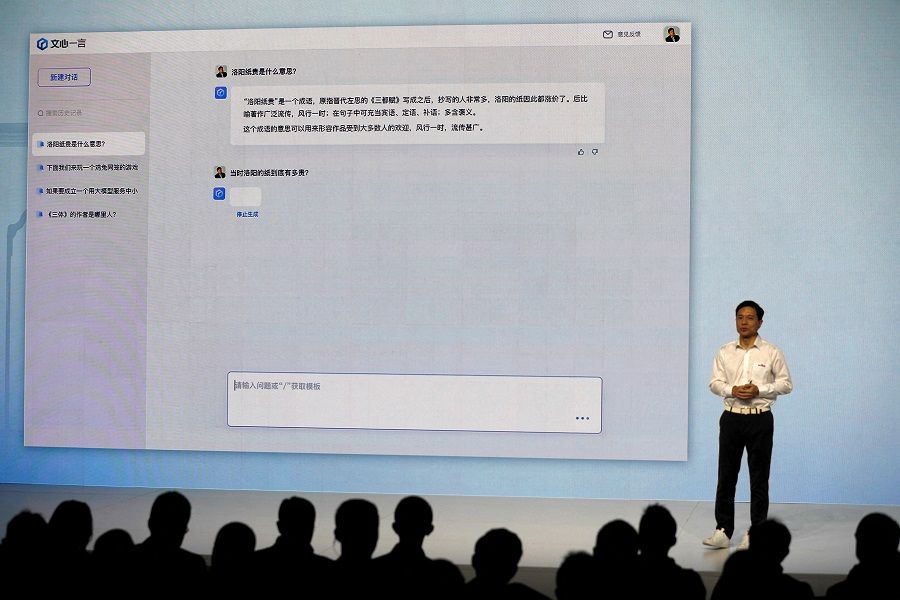 Baidu co-founder and CEO Robin Li showcases AI-powered chatbot known as ERNIE Bot during a news conference at the company's headquarters in Beijing, China, 16 March 2023. (Tingshu Wang/File Photo/Reuters)